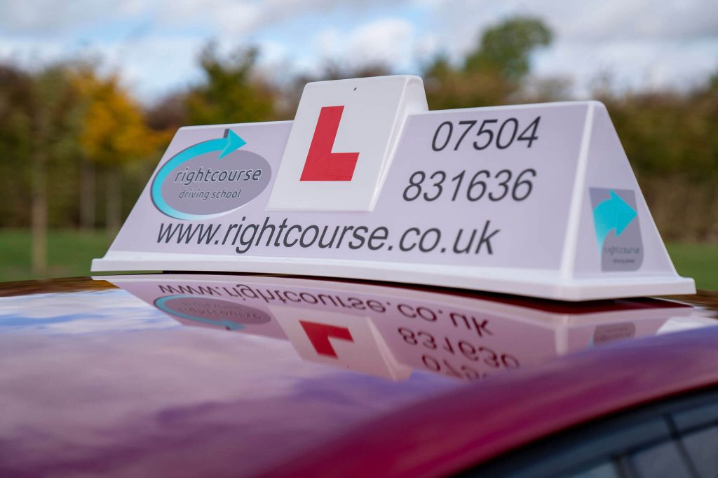 Right Course Driving Schools car roof sign