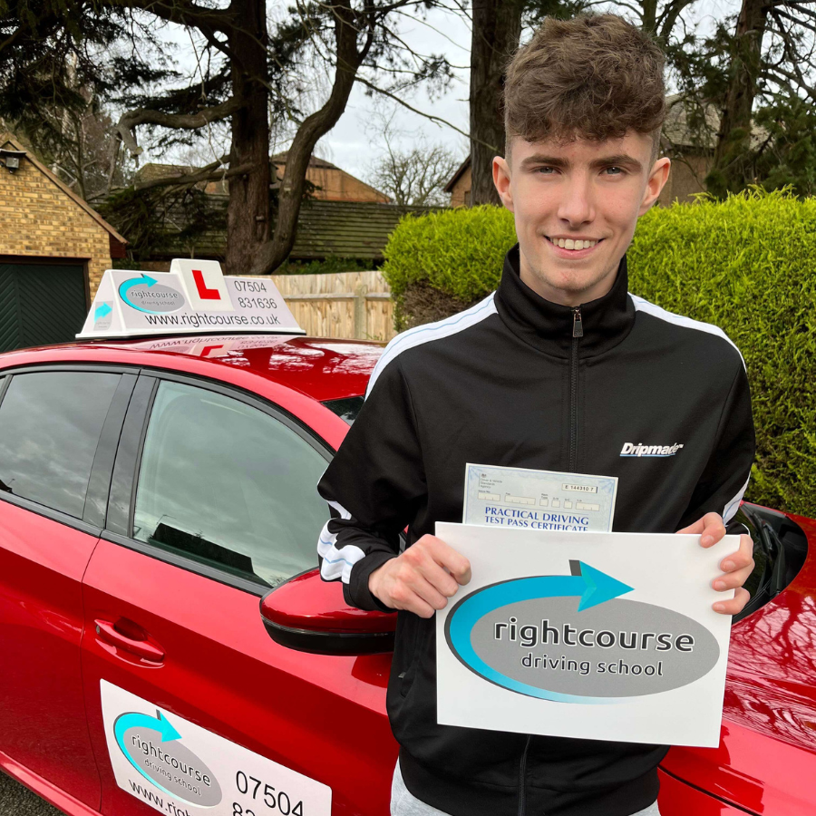 Right Course Driving School pupil holding his driving test pass certificate