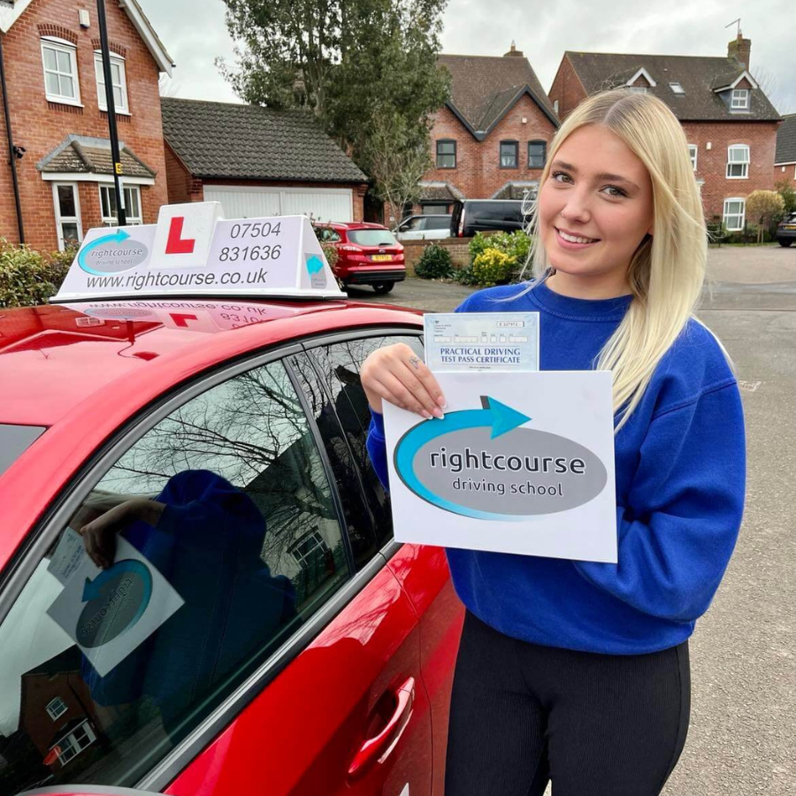 Right Course learner holding her pass certificate