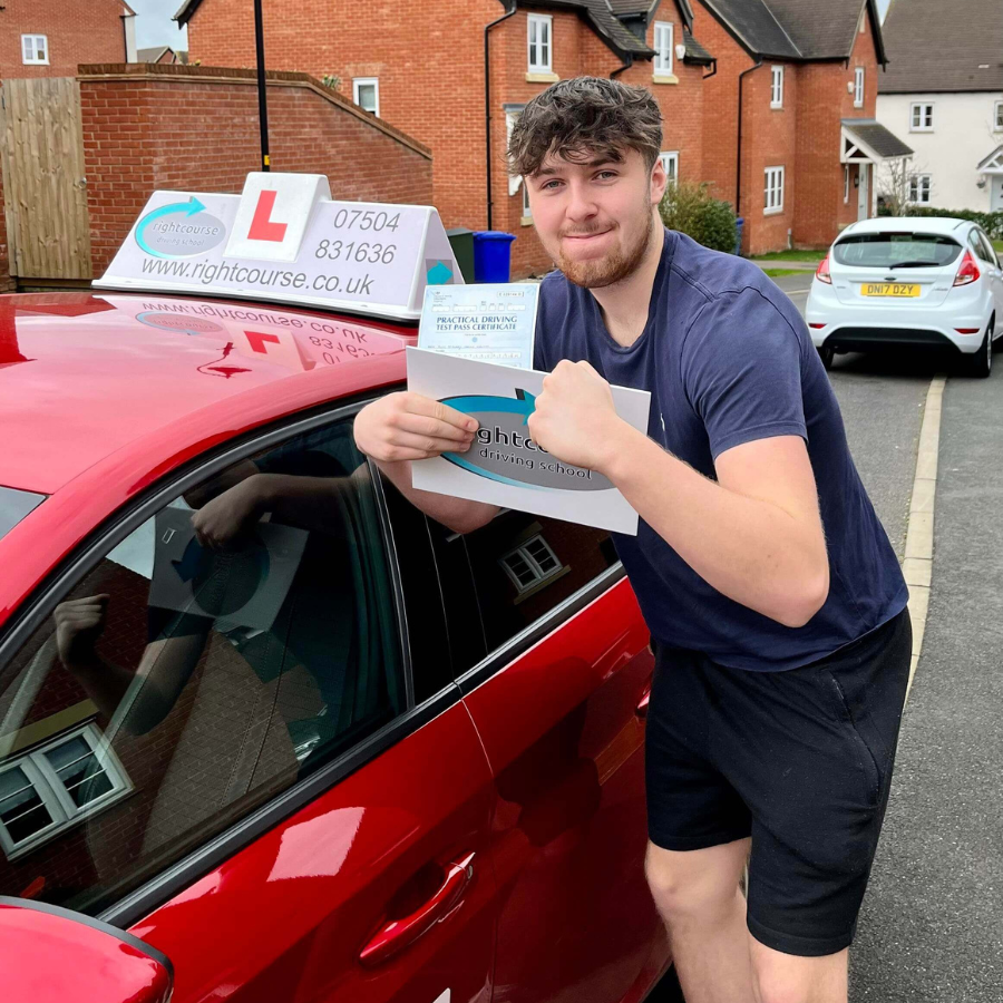 Right Course Driving School learner showing how pleased he is with the test result.