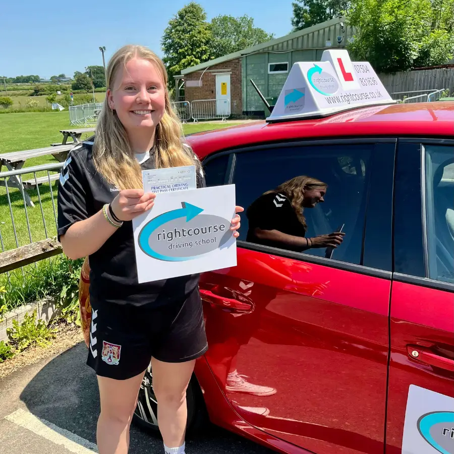 Phoebe Holding Her Pass Certificate