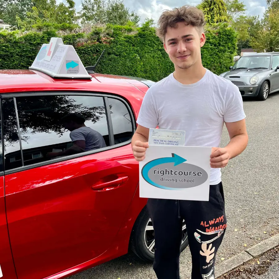 Right Course Driving School learner with his driving test pass certificate