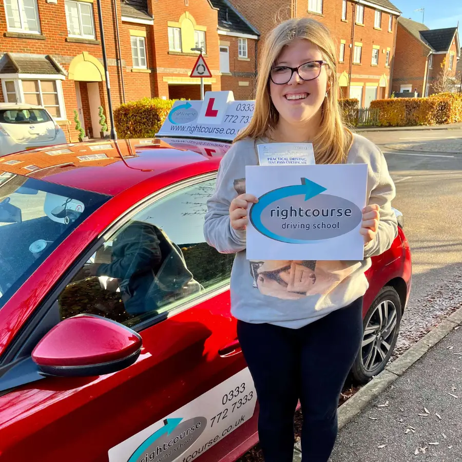 Right Course driving school learner holding her pass certificate.