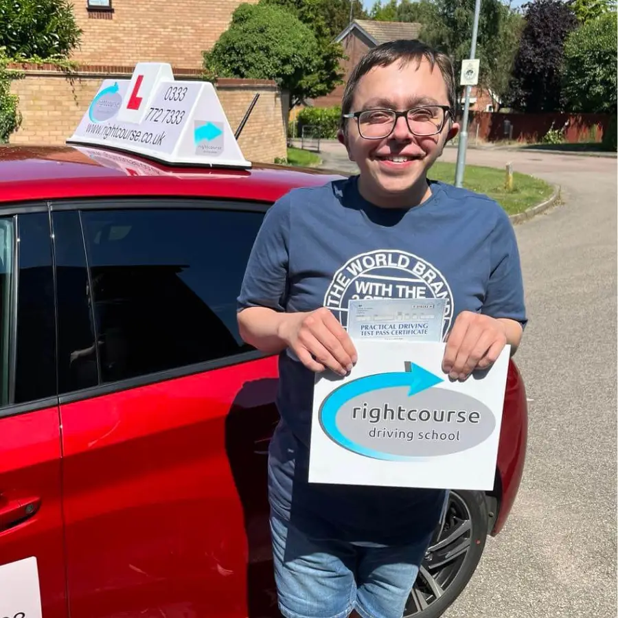 Ewan Holding His Pass Certificate
