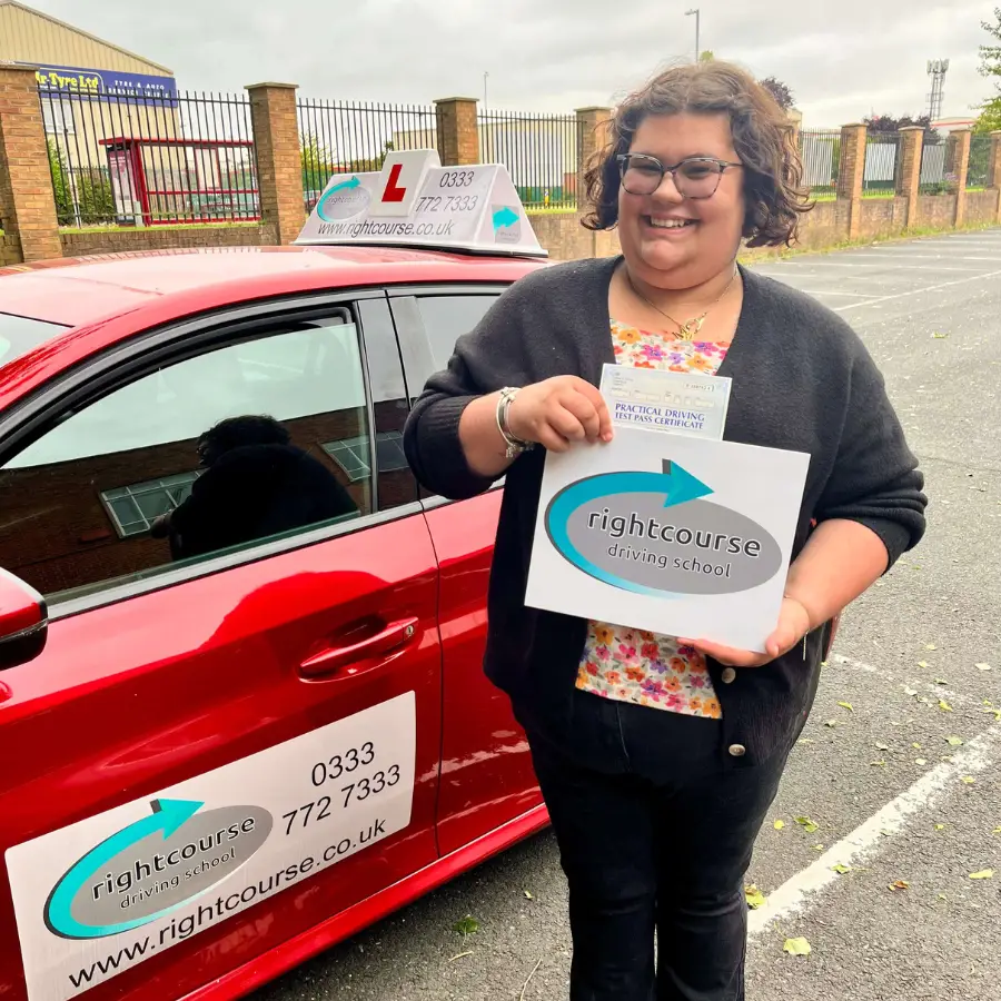 Molly Holding Her Pass Certificate