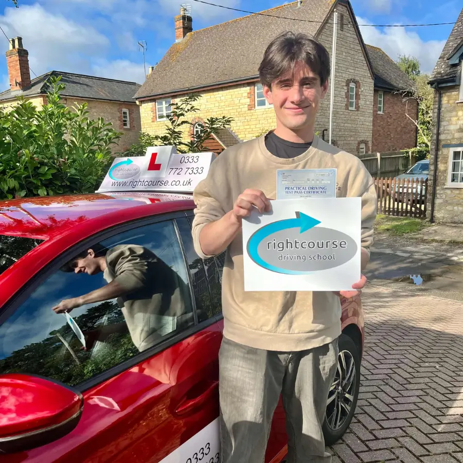 Felix With His Pass Certificate